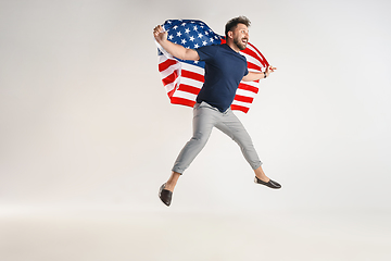 Image showing Young man with the flag of United States of America