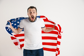 Image showing Young man with the flag of United States of America