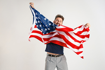 Image showing Young man with the flag of United States of America