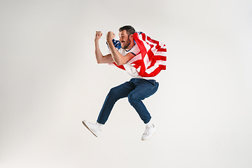 Image showing Young man with the flag of United States of America