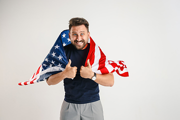 Image showing Young man with the flag of United States of America