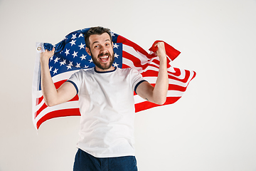 Image showing Young man with the flag of United States of America