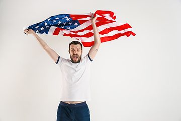 Image showing Young man with the flag of United States of America