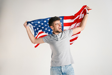 Image showing Young man with the flag of United States of America