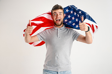 Image showing Young man with the flag of United States of America