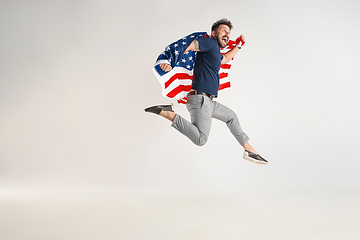 Image showing Young man with the flag of United States of America