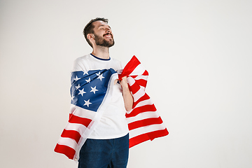 Image showing Young man with the flag of United States of America