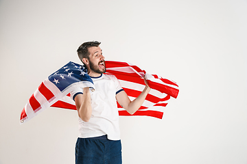 Image showing Young man with the flag of United States of America