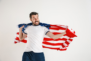 Image showing Young man with the flag of United States of America