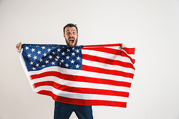 Image showing Young man with the flag of United States of America