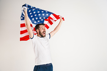 Image showing Young man with the flag of United States of America