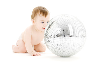 Image showing adorable baby boy with big disco ball