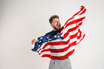 Image showing Young man with the flag of United States of America