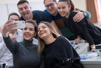 Image showing young happy students doing selfie picture