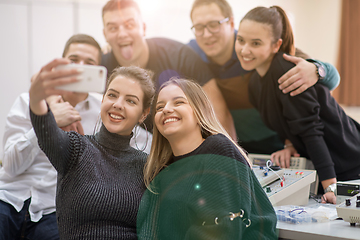 Image showing young happy students doing selfie picture