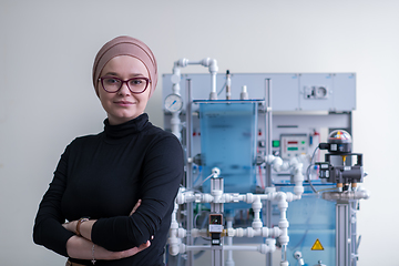 Image showing portrait of muslim female student in the electronic classroom