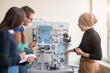 Image showing young students doing practice in the electronic classroom