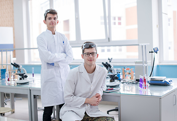 Image showing Group of young medical students doing research