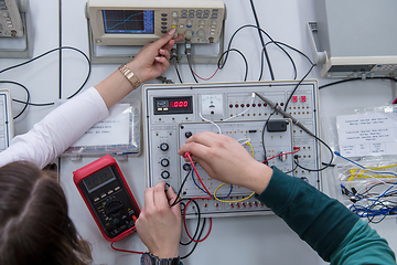 Image showing students doing practice in the electronic classroom top view