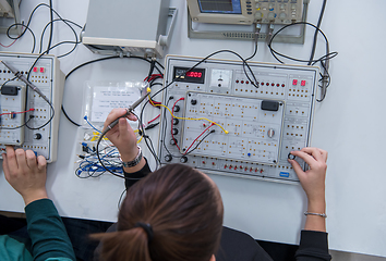 Image showing students doing practice in the electronic classroom top view