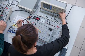 Image showing students doing practice in the electronic classroom top view