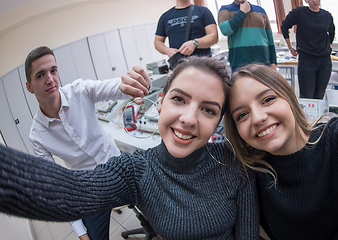 Image showing young happy students doing selfie picture