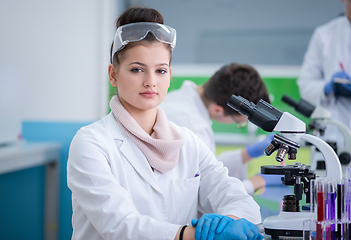 Image showing Group of young medical students doing research