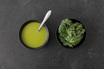 Image showing kale cabbage cream soup in bowl with spoon