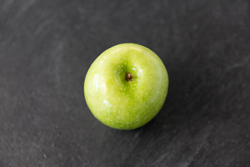 Image showing ripe green apple on slate stone background