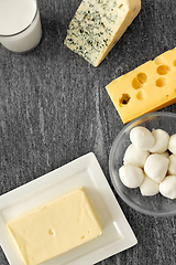 Image showing different kinds of cheese, milk glass and butter