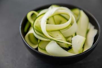 Image showing peeled or sliced zucchini in ceramic bowl