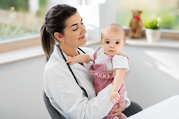 Image showing female pediatrician doctor with baby at clinic