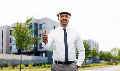 Image showing architect showing thumbs up on city street