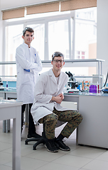 Image showing Group of young medical students doing research