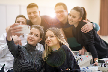 Image showing young happy students doing selfie picture