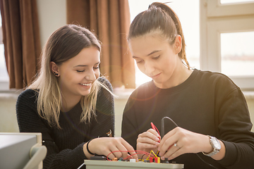 Image showing students doing practice in the electronic classroom