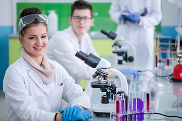 Image showing Group of young medical students doing research