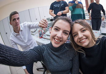 Image showing young happy students doing selfie picture