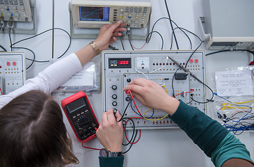 Image showing students doing practice in the electronic classroom top view