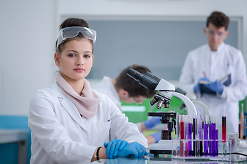 Image showing Group of young medical students doing research