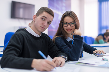 Image showing young students writing notes