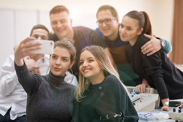 Image showing young happy students doing selfie picture