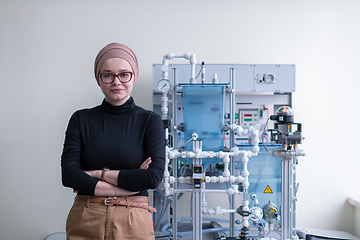 Image showing portrait of muslim female student in the electronic classroom