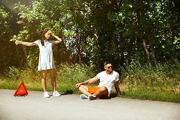 Image showing Young couple traveling on the car in sunny day