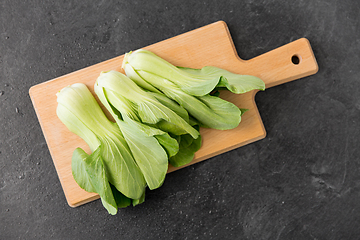 Image showing bok choy chinese cabbage on wooden cutting board