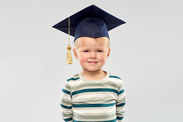 Image showing smiling little boy in mortar board