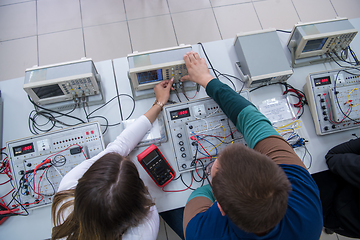 Image showing students doing practice in the electronic classroom top view