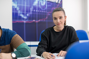 Image showing female student writing notes