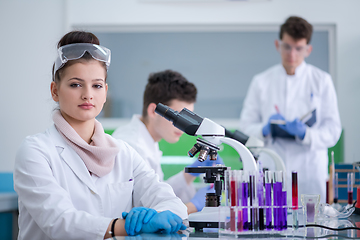 Image showing Group of young medical students doing research