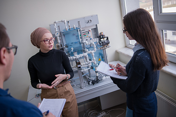 Image showing young students doing practice in the electronic classroom